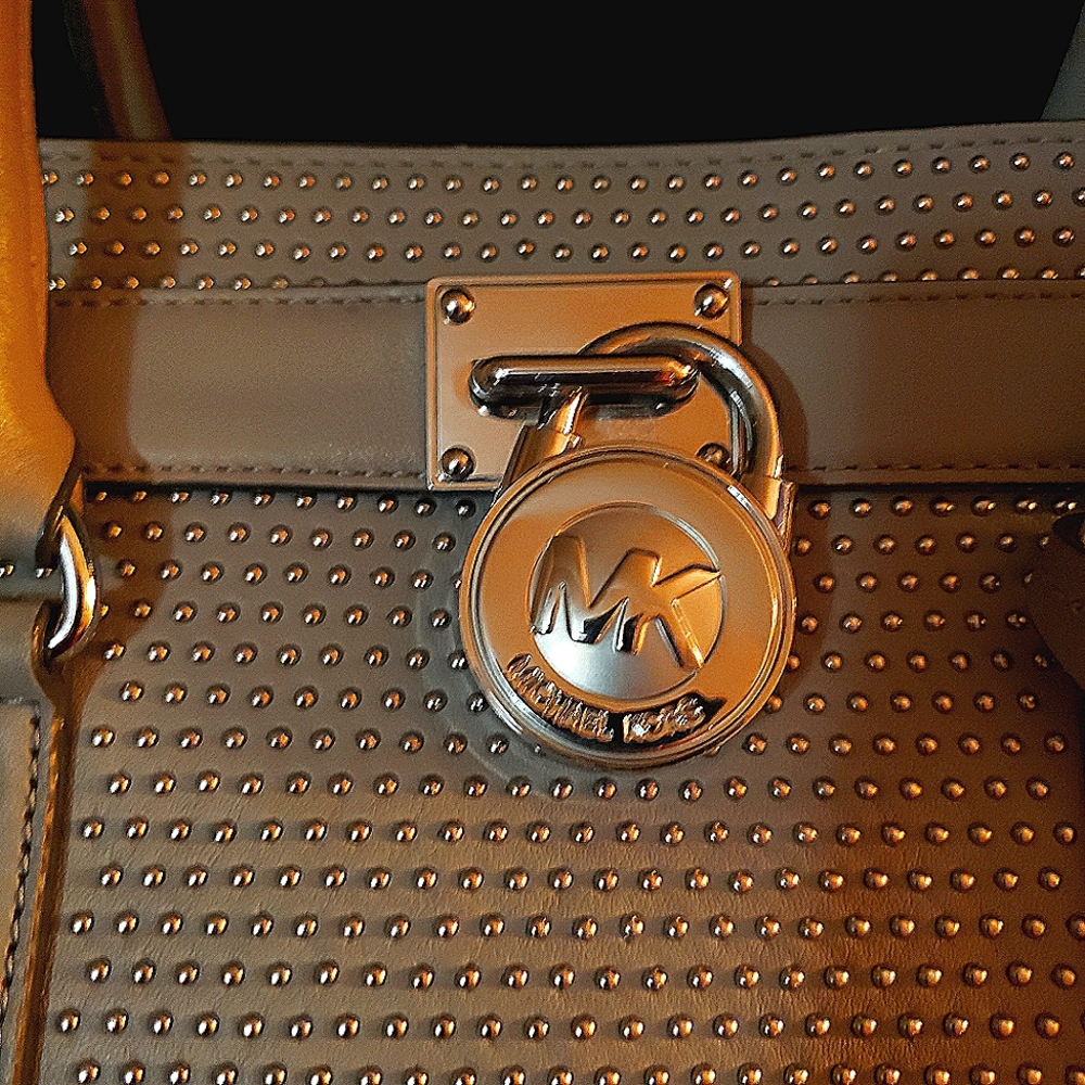 Michael Kors gorgeous gray with silver studs.